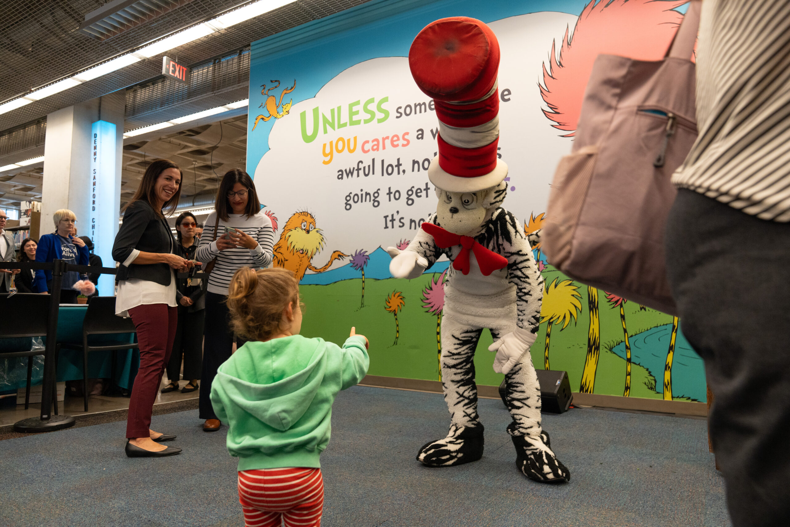 Child meeting the Cat in the Hat